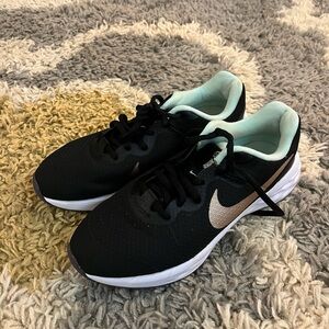 Nike Black gold, and green Athletic Shoes